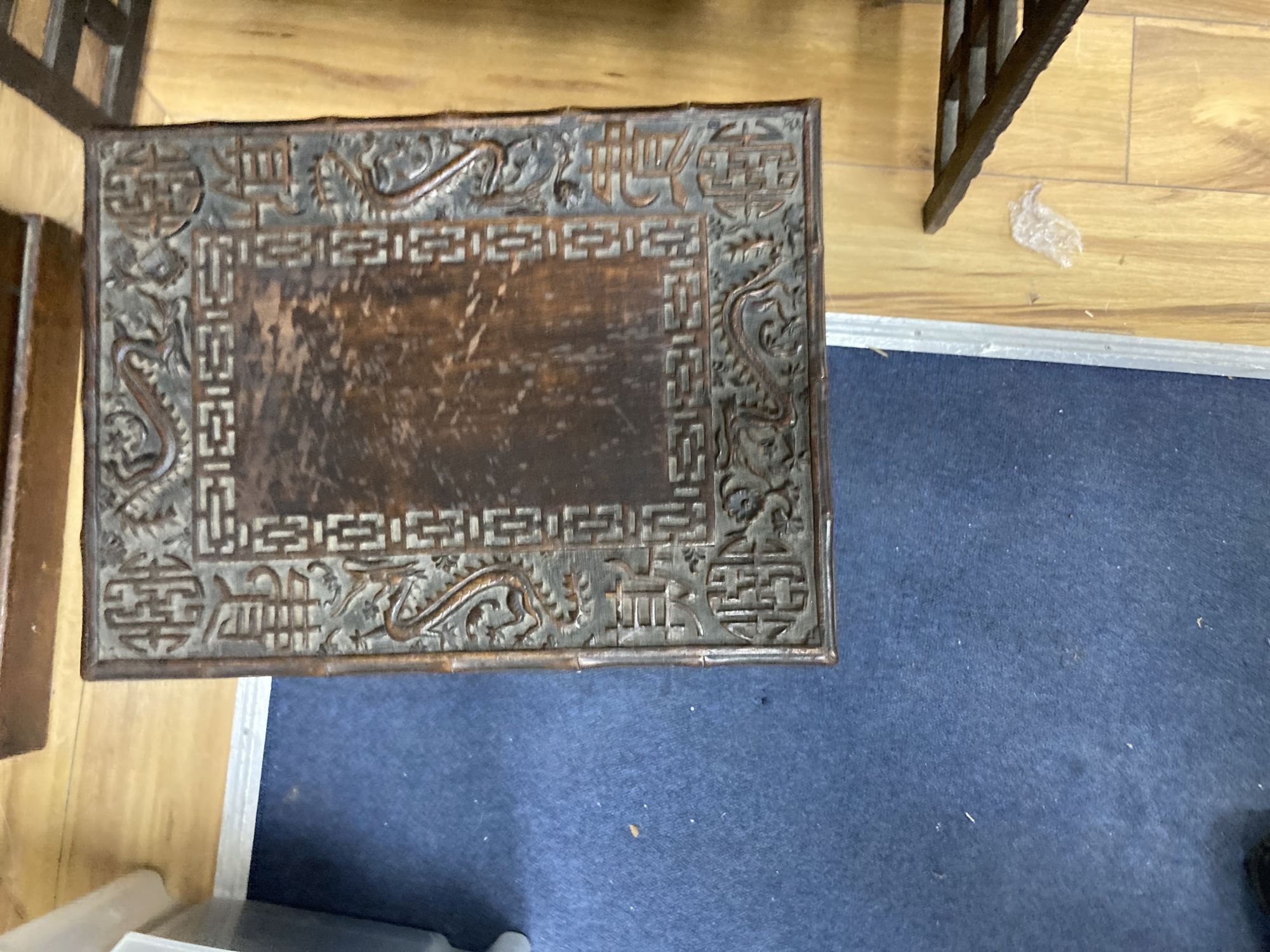 A Chinese carved hongmu folding table, width 83cm depth 56cm height 67cm, and a similar stool/stand, early 20th century